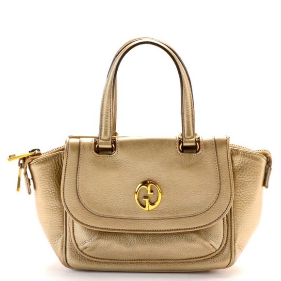 Gucci Handbags - ❣️Gucci "1973" Top Handle bag in leather